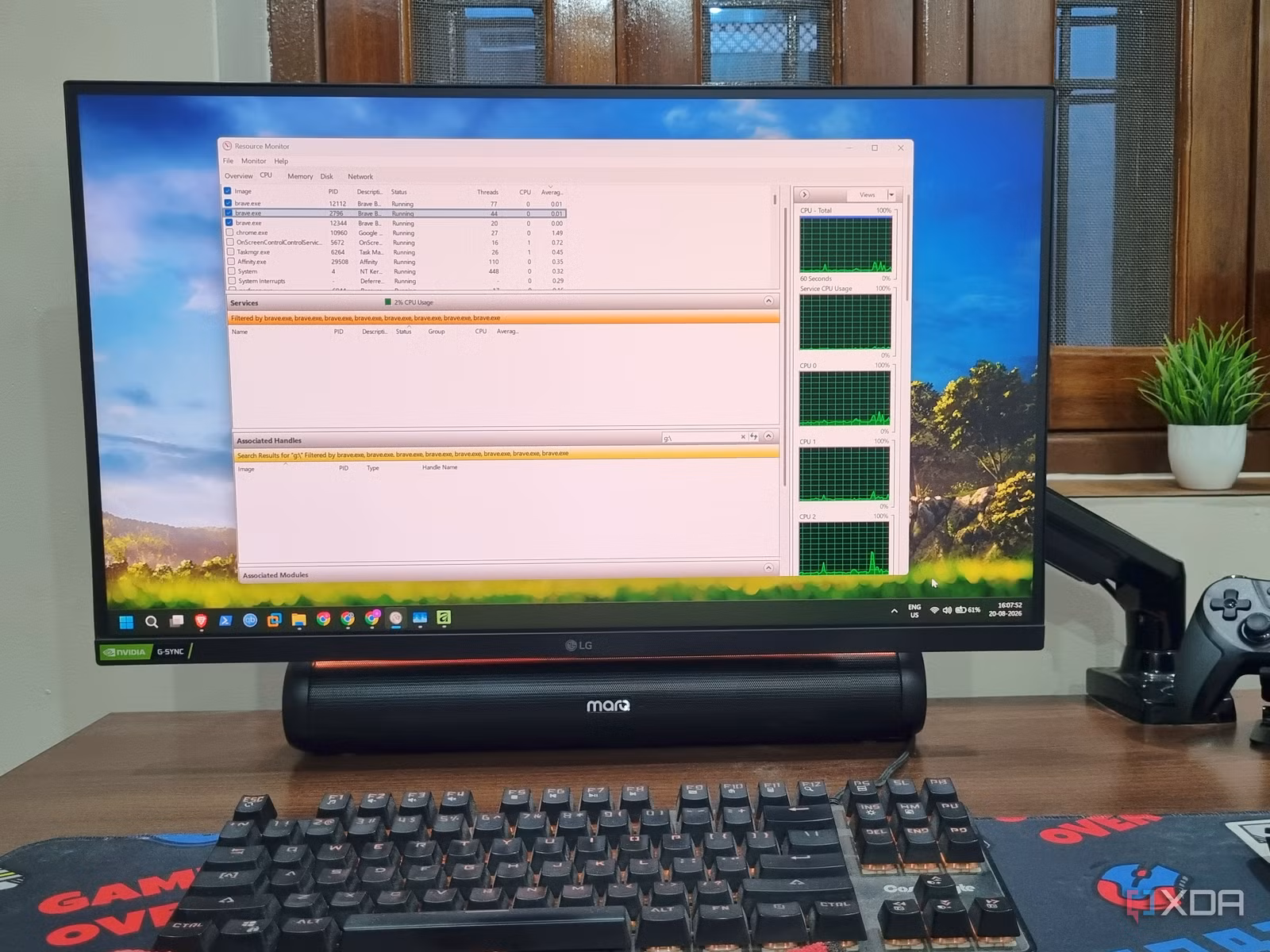 A systems specialist troubleshooting Windows Resource Monitor to fix 100% disk usage on a workstation drive